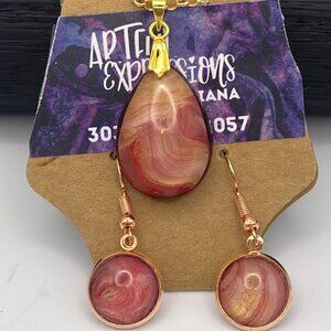 Acrylic paint skin dangle earrings and teardrop necklace set.